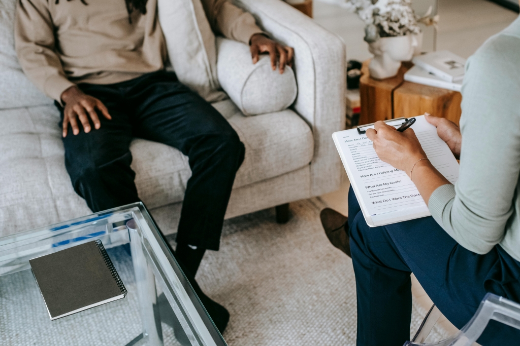 A person experiencing emotional relief during a counseling session, representing the positive impact of depression therapy.